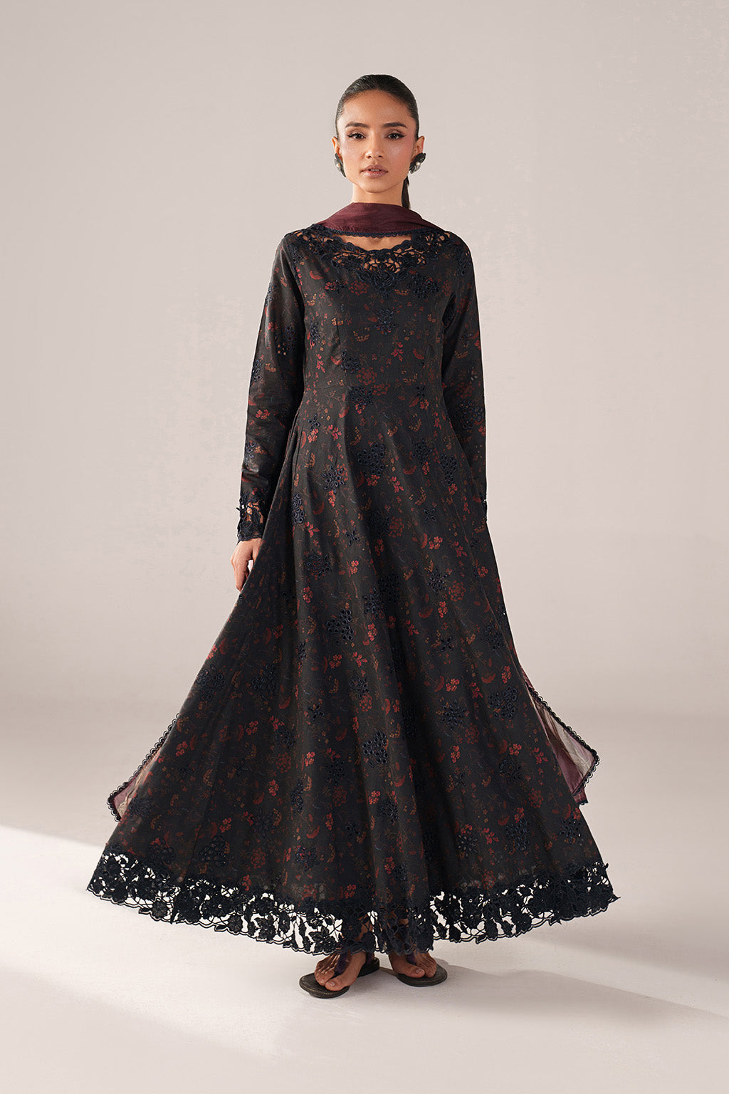 black dress design lawn FOR MUHARRAM Design Code :RP-32 . The black lawn dress with a chiffon  dupatta is a timeless and elegant choice. The dress features a rich black  color, exuding sophistication and versatility. The